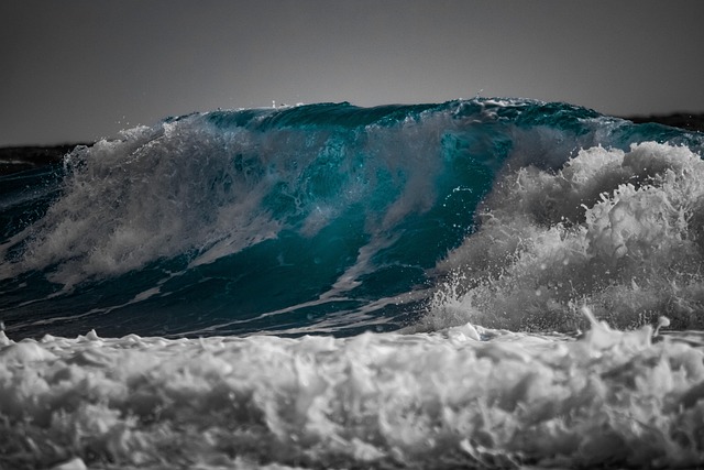 surfer riding clean ocean wave Ireland surf lesson